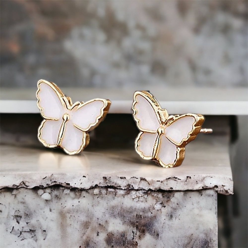 Tiny Petite beautiful pearl-colored butterfly earrings. - Picture 7 of 9